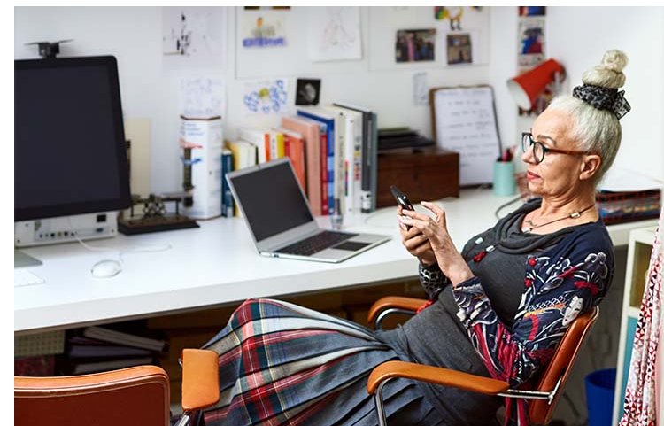 Woman on phone in office.